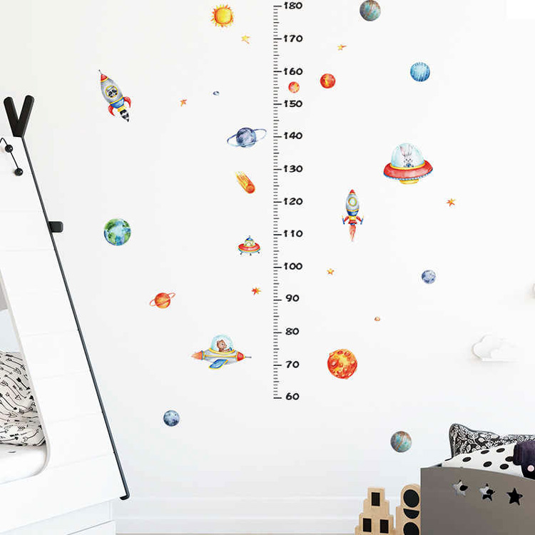 Наклейка-ростомір з планетами в космосі